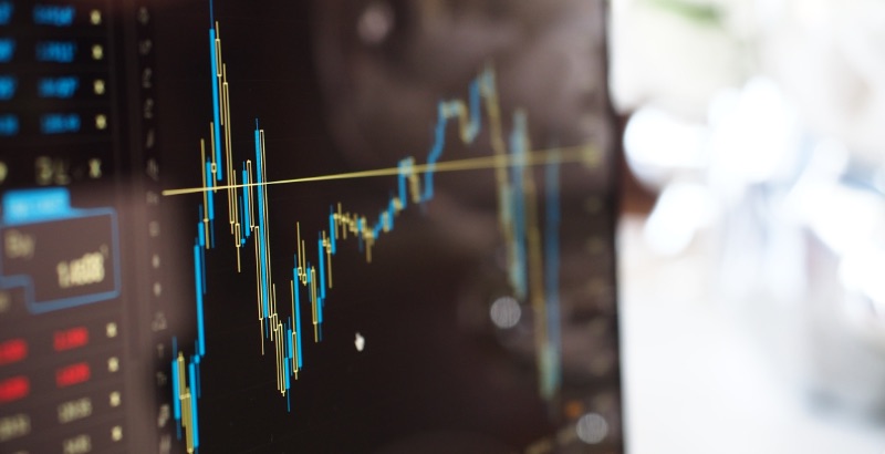 thumbnail blue and yellow graph on stock market monitor 159888 1